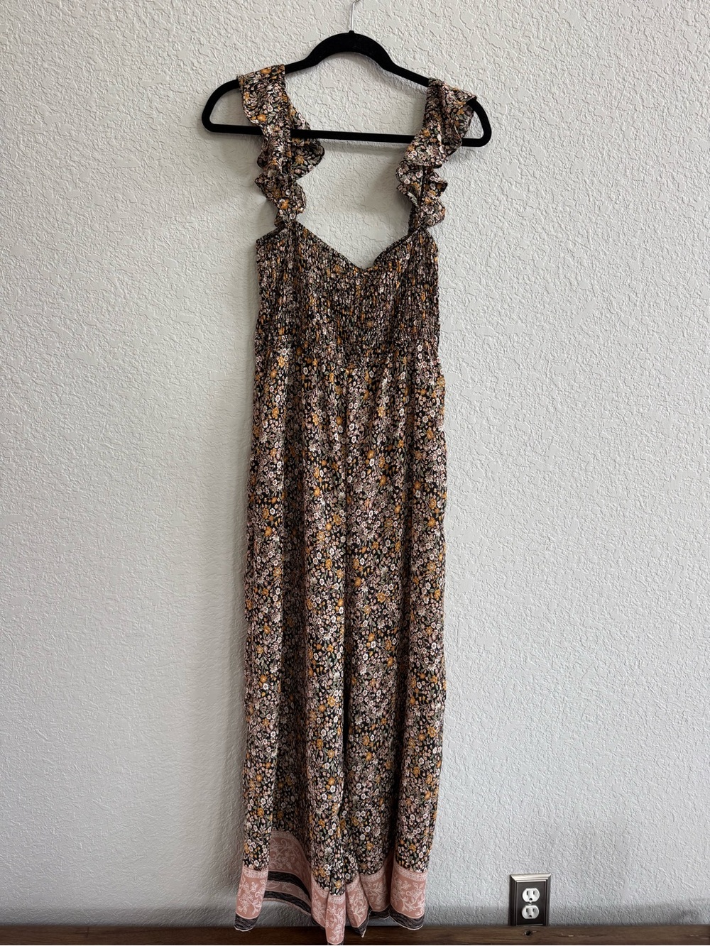 Flowy Floral Smocked Ruffle-Strap Jumpsuit in Black